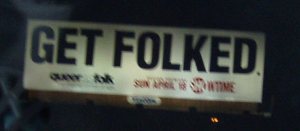 Billboard proclaiming 'Get Folked'