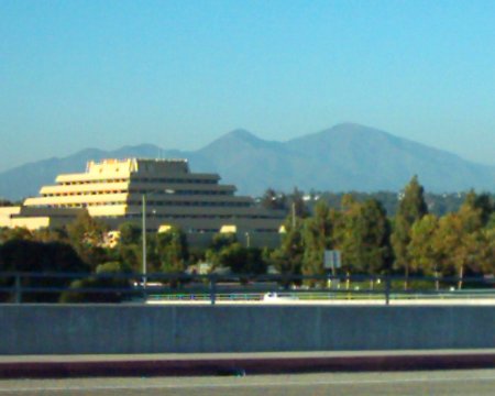 Pyramid-shaped federal building, Mt. Saddleback in the background.