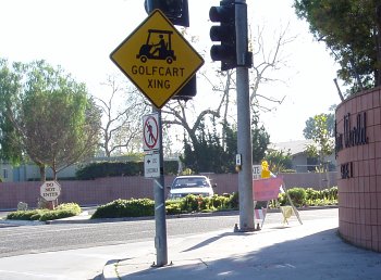 Street sign: Golfcart Xing
