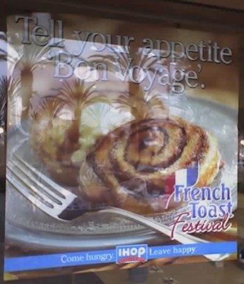 IHOP poster with slogan: Tell your appetite "Bon voyage!"