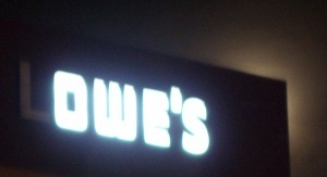 Lowe's sign, reads as OWE'S