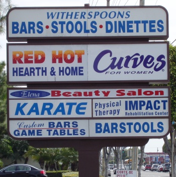 Sign: Red Hot Hearth and Home, Curves, Karate, and Impact Physical Therapy Rehabilitation Center