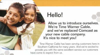 Hello!  We're Time Warner Cable!  (With a picture of two children.)