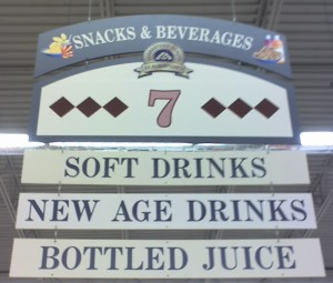 Grocery aisle containing New Age Drinks