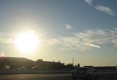 Sun and sundog above freeway