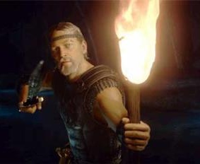 Beowulf carries a torch