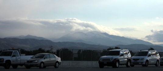 Mt. Saddleback and hills shrouded in cloud.