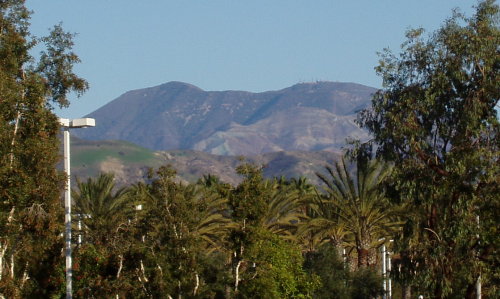 Saddleback with a large hill in front of it