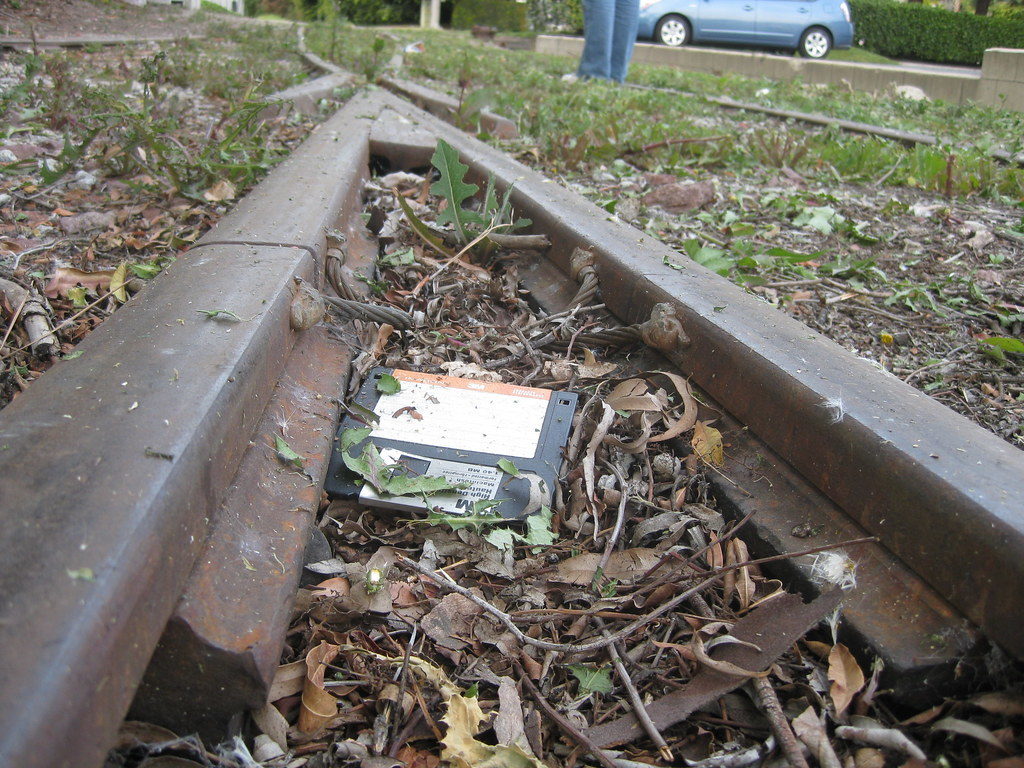 Floppy disk on the train tracks.