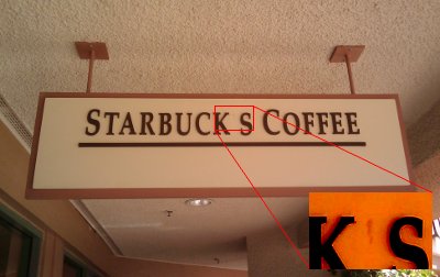 Starbucks sign with an apostrophe removed