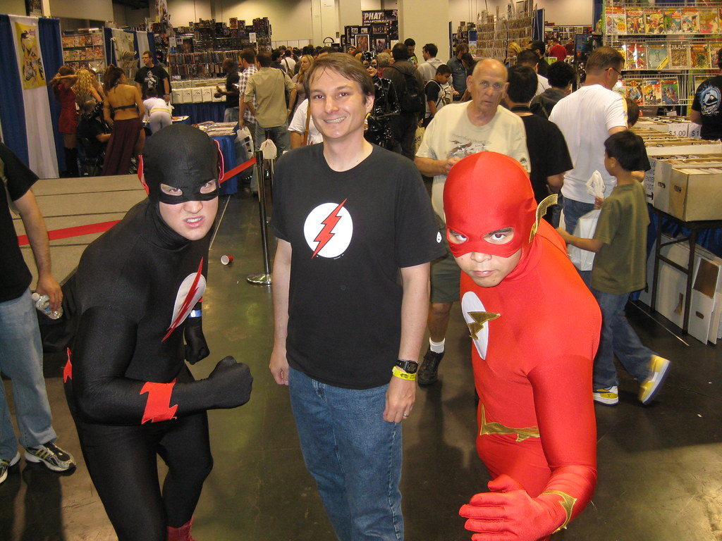 Me in a Flash T-shirt posing with Flash and Black Flash cosplayers.