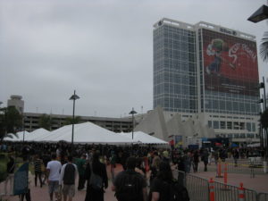 Hall H Line and Hilton hotel with a giant Scott Pilgrim banner on it.