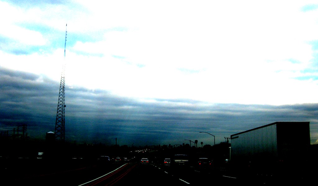 Rays of light and shadow converge in the distance.