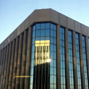 Buildings reflecting the setting sun