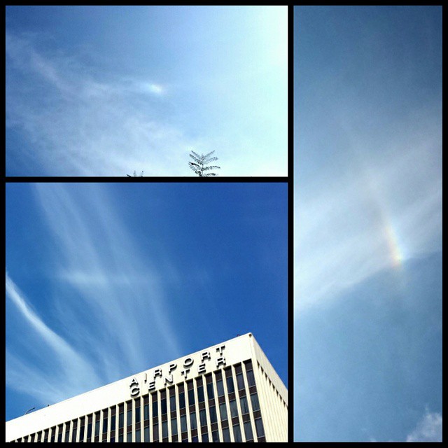 Collage of 3 photos of the sky. 1: a bright spot in the middle of the sky. 2. A bright almost horizontal line above a building, curving slightly upward. 3. A bright vertical line, curving slightly to the left with a faint reverse rainbow pattern, the red on the inner edge and blue on the outer.