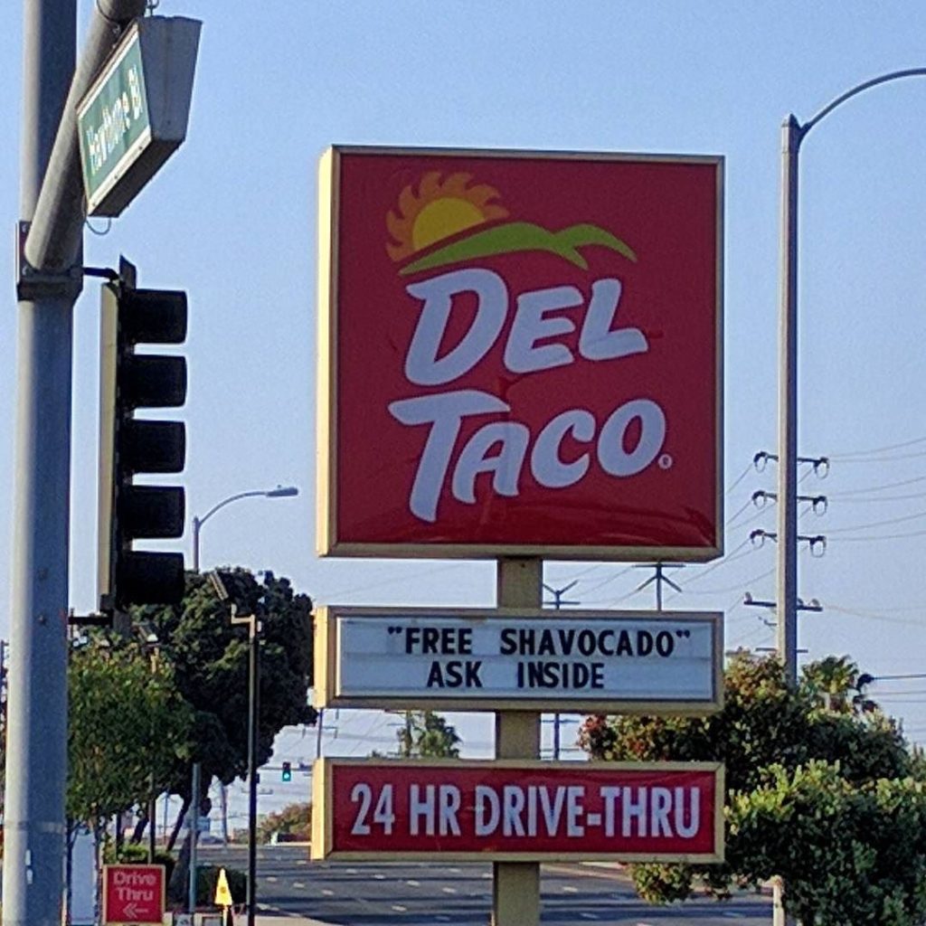 The Del Taco sign actually says Free Shavocado (ask inside)