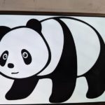 Panda drawing displayed on a tablet.