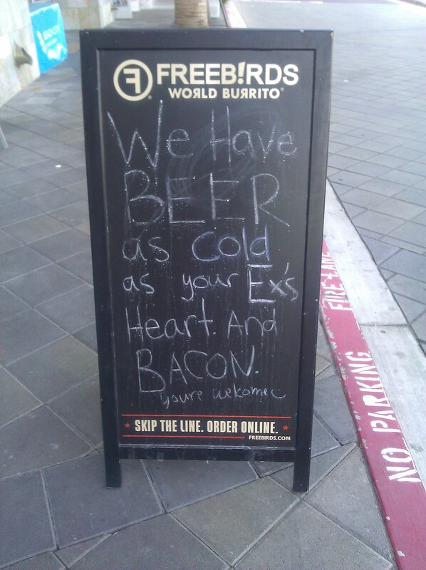 Freebirds sign: Beer as cold as your ex's heart - and bacon. You're welcome.