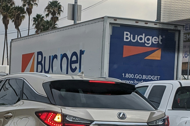 Budget rental truck with parts of the letters covered up to say Burner instead.