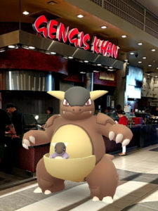 A Kangaskhan in front of a Mongolian BBQ counter called Gengis Khan