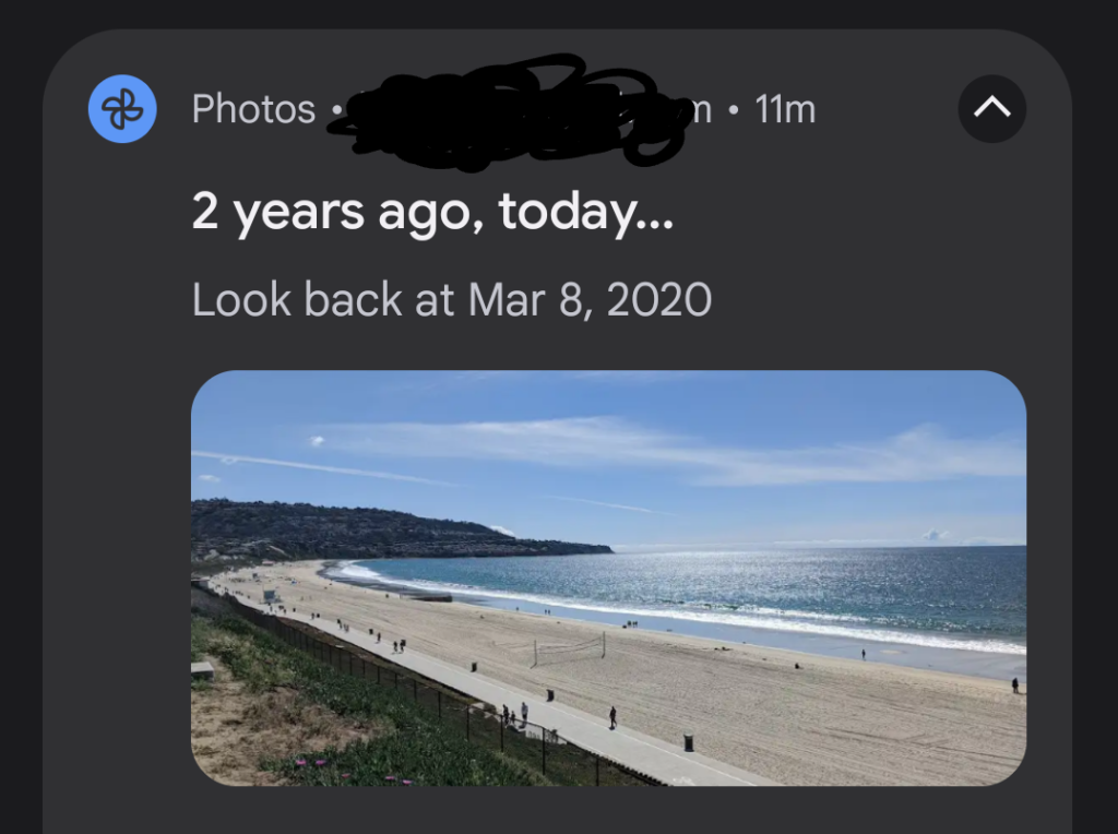 Google Photos notification with 2 years ago, today, March 8, 2020, and a picture of a curving coastline