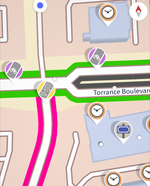 Street Map with icons indicating need for bicycle, street name, and other information, with some streets highlighted in green, gray or magenta.